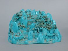 A Chinese model of a boulder carving. 21 cm wide.