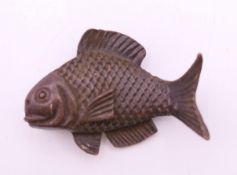 A bronze model of a fish. 5 cm long.
