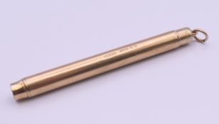A Sampson Mordan & Co 9 ct gold propelling pencil. 7.5 cm long. 13.5 grammes total weight.