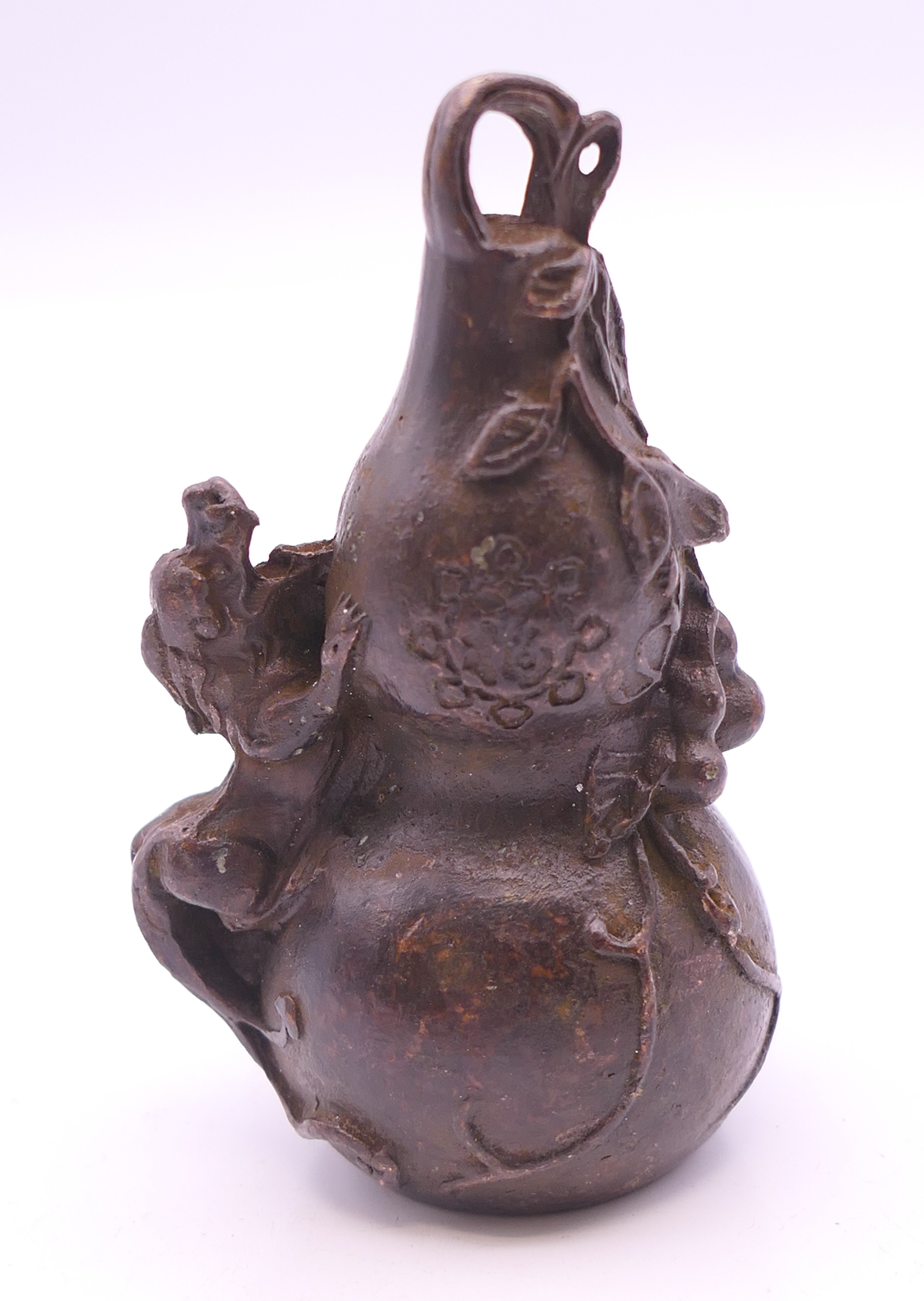 A bronze double gourd. 7 cm high. - Image 2 of 5