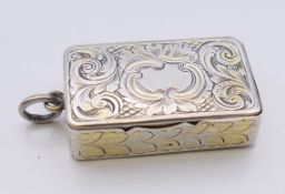 A Victorian silver snuff box fob, Birmingham 1854. 3.25 x 2 cm. 11.4 grammes.