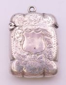 A Victorian silver vesta converted to a lighter, with leaf chased pattern, Birmingham 1875.