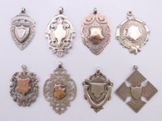 Eight silver fobs, mostly hallmarked for Birmingham. 73.6 grammes.