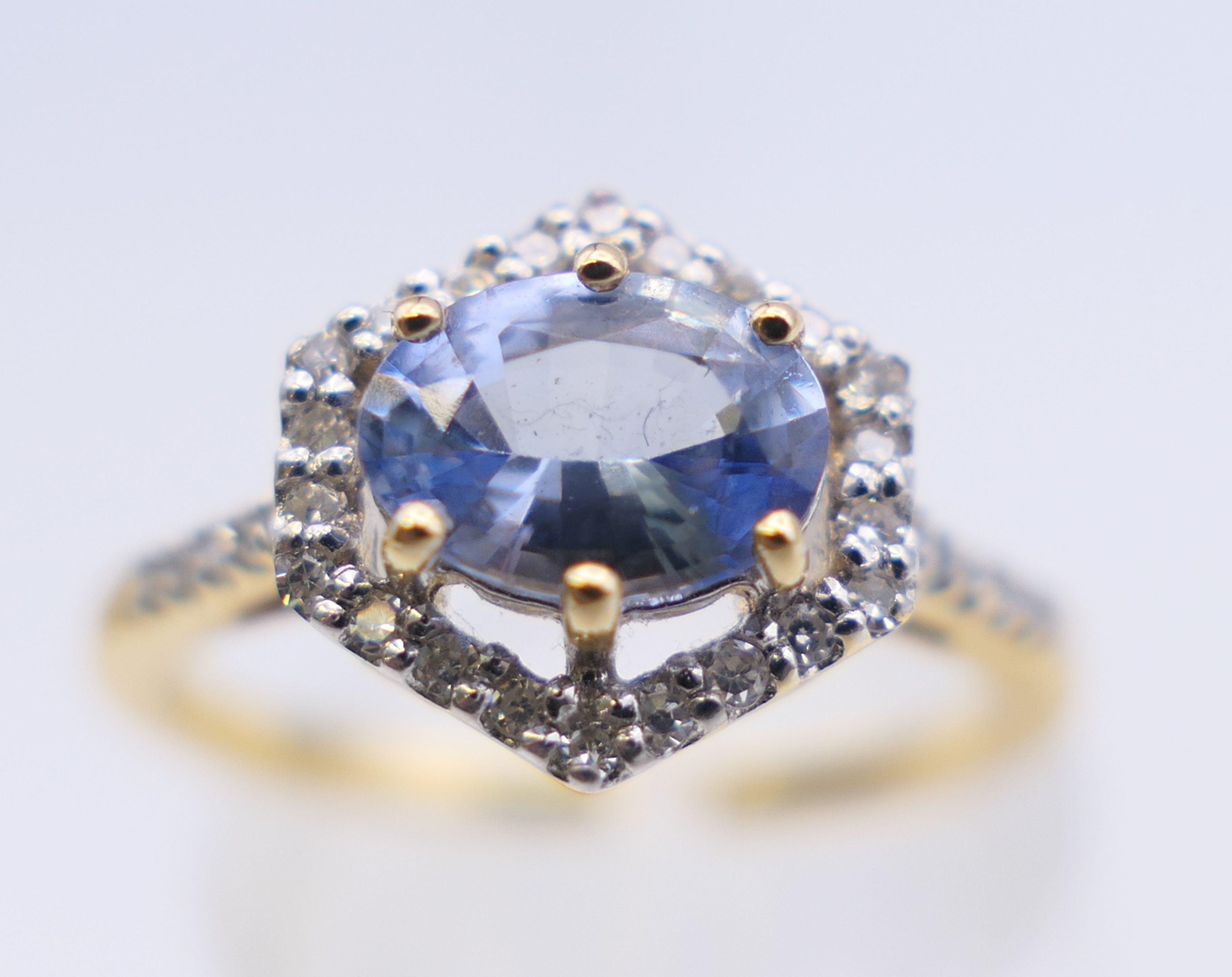 An 18 ct gold Ceylon sapphire and diamond ring. 10 mm x 10 mm. Ring size L/M. 3. - Image 9 of 9