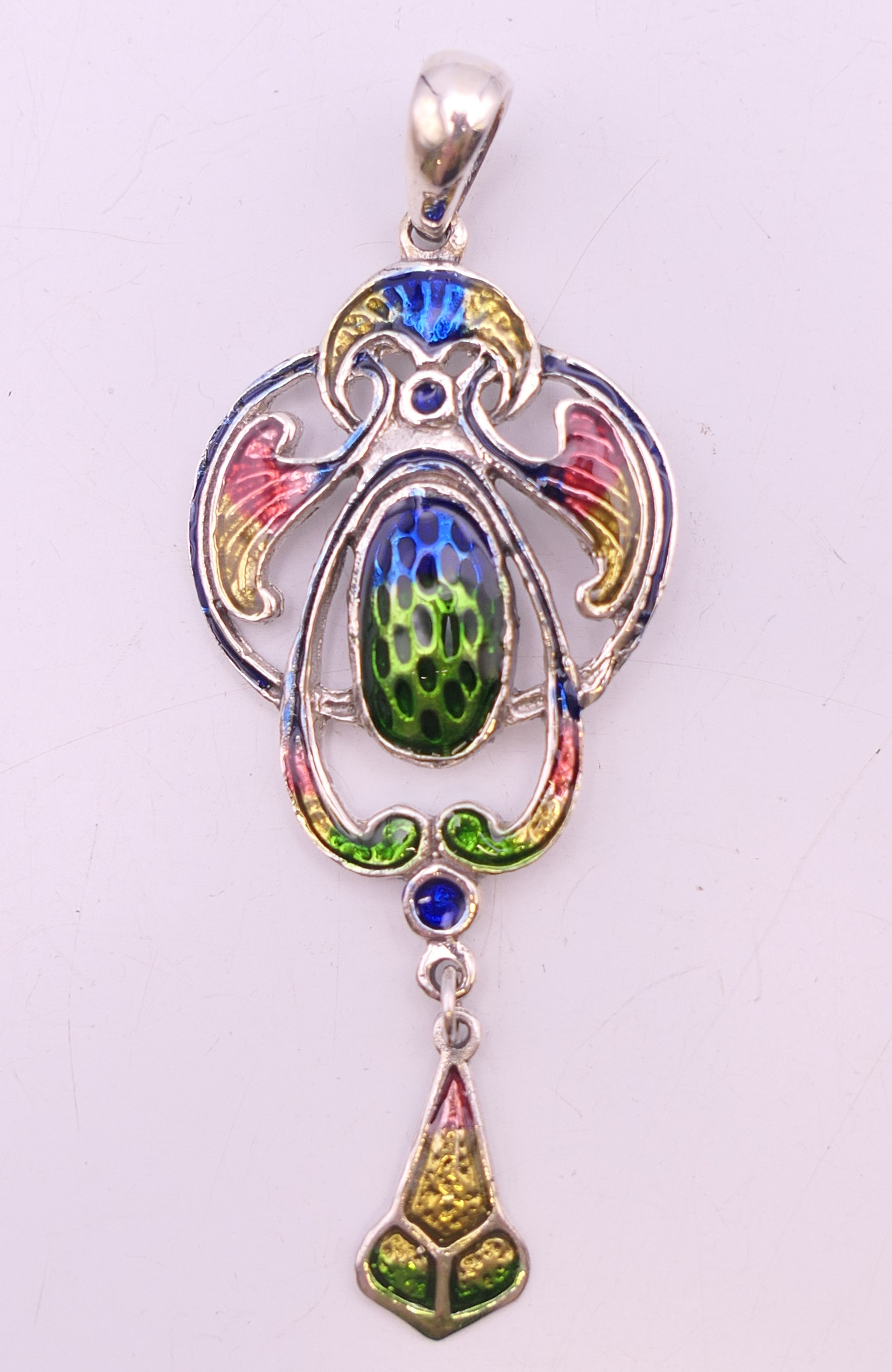 A silver Art Nouveau style pen. 6 cm high.