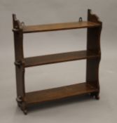 An oak hanging shelf. 55 cm wide.