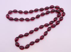 A string of beads. 43 cm long.