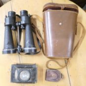 A pair of Barr and Stroud binoculars, a WWII compass and a Wooton signalling lantern. The former 26.