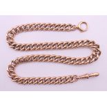 A 9 ct gold curb link watch chain. 40 cm long. 25.4 grammes.