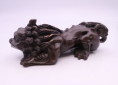 A bronze dog-of-fo. 7.5 cms long.