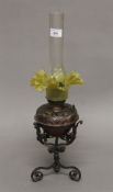 An Arts and Crafts oil lamp. 52 cm high overall.