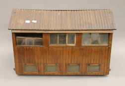 A late 19th/early 20th century model chicken coup. 62.5 cm long.