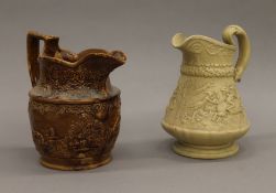 Two Victorian stoneware harvest jugs. The largest 20 cm high.