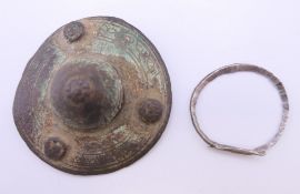 An antiquity, possibly Saxon clasp/shield boss. 5 cm diameter.