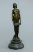 An Art Nouveau style bronze figurine. 19 cm high.