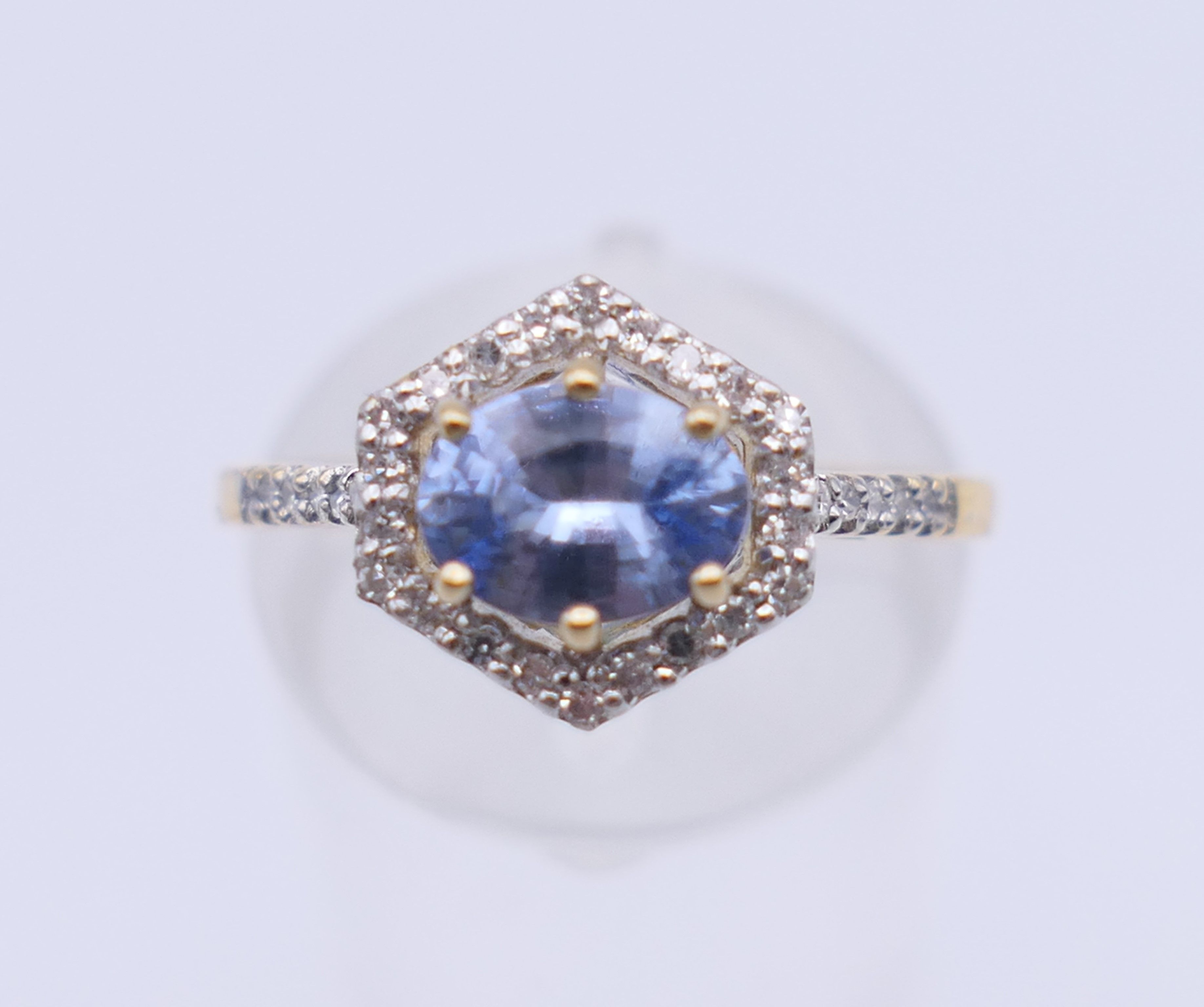 An 18 ct gold Ceylon sapphire and diamond ring. 10 mm x 10 mm. Ring size L/M. 3. - Image 2 of 9