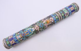 A silver and enamel cigar holder bearing Russian marks. 19.5 cm long.