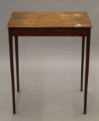 A 19th century mahogany side table. 60 cm long.