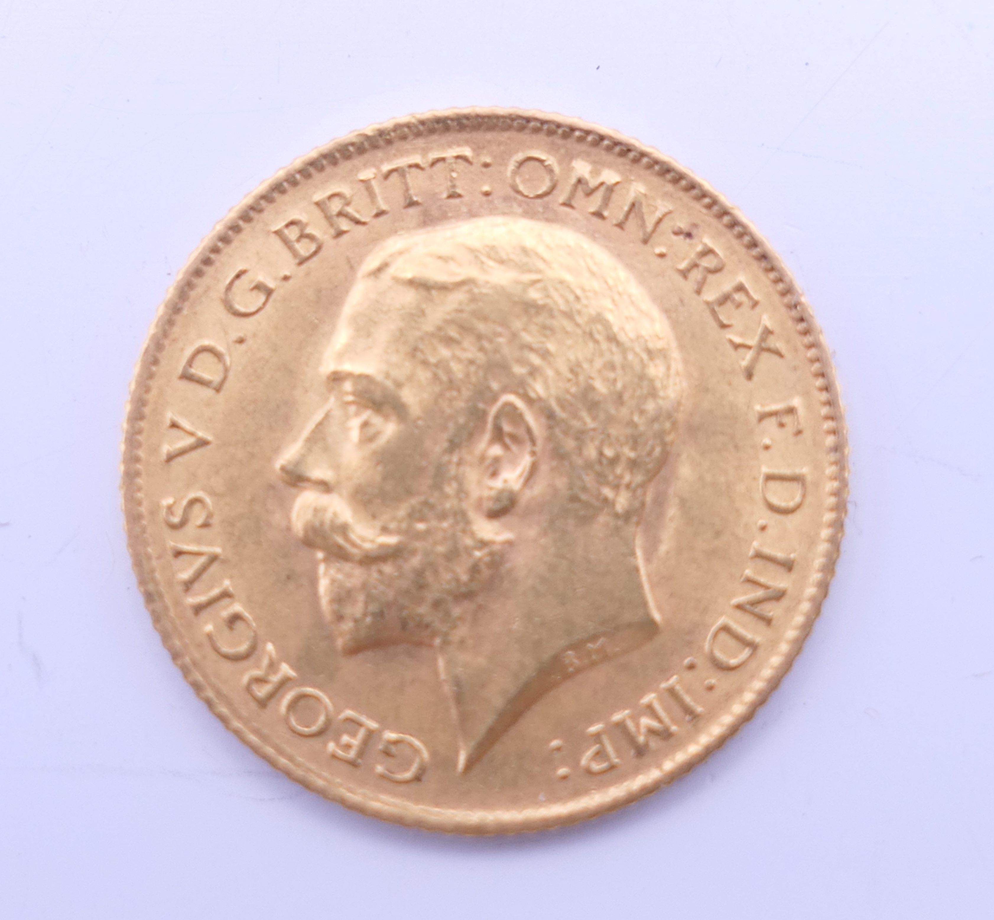 A 1912 gold half sovereign.