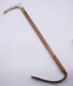 A George V malacca hunting whip with stag antler handle and silver collar,