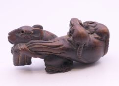 A three rats netsuke. 6 cm long.