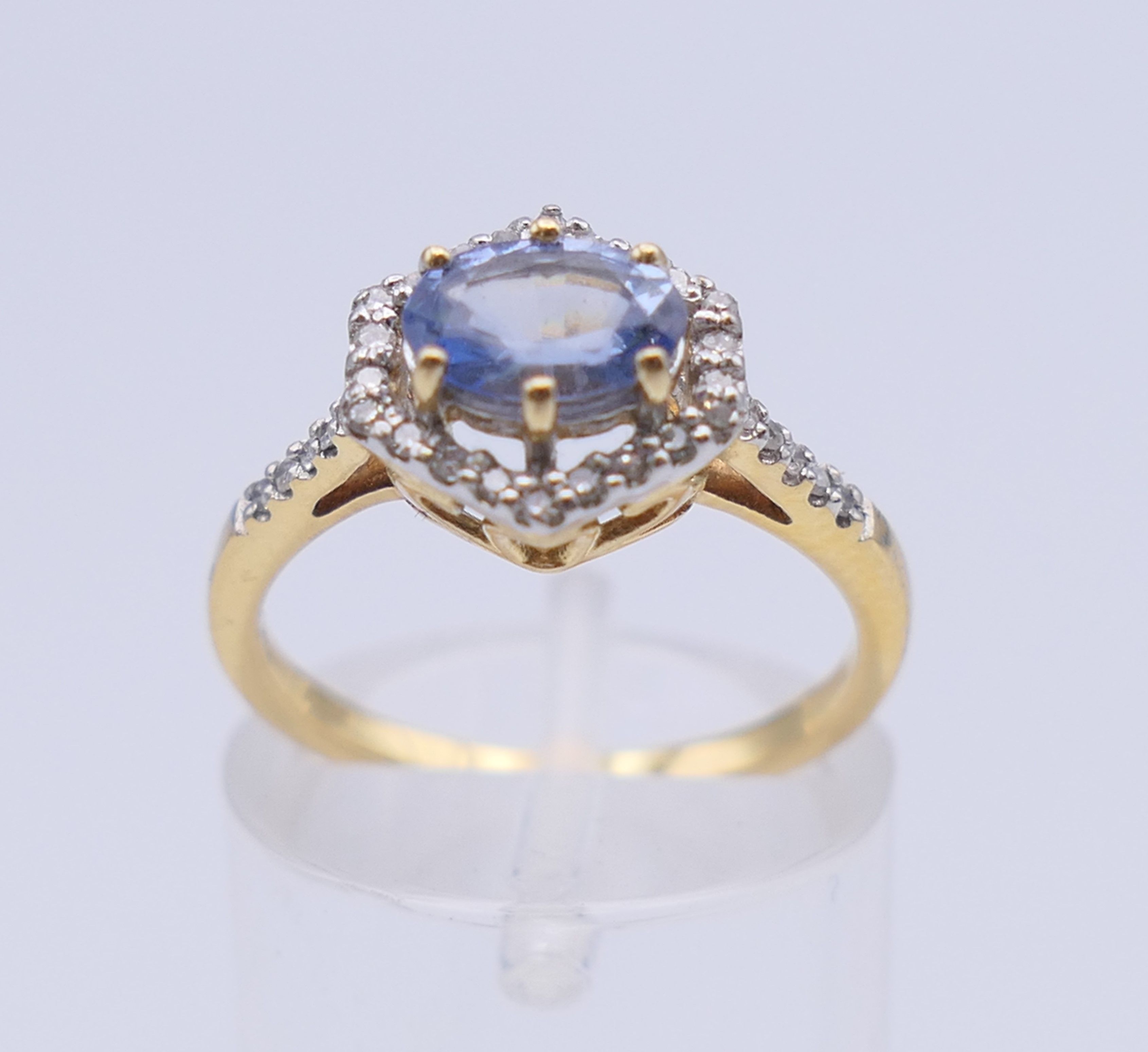 An 18 ct gold Ceylon sapphire and diamond ring. 10 mm x 10 mm. Ring size L/M. 3. - Image 3 of 9