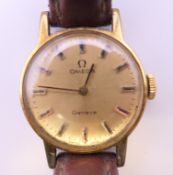An Omega ladies wristwatch. 2 cm wide.