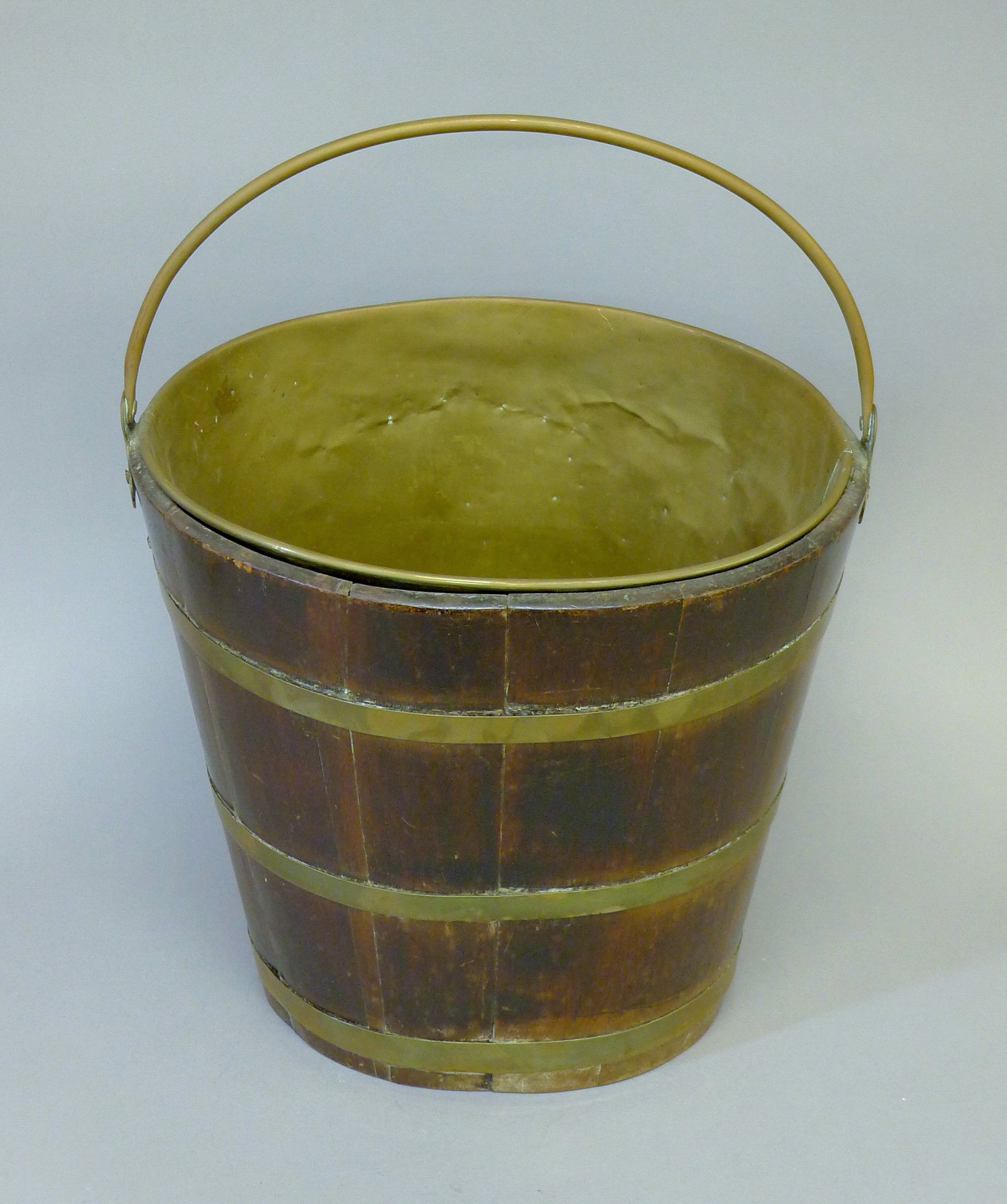 A brass bound log bucket. 34 cm wide.