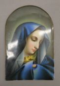 A 19th century Continental painted porcelain plaque depicting The Virgin Mary,