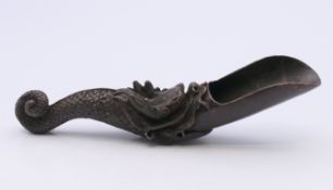 A Japanese bronze dragon scoop. 12 cm long.