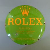 An enamel Rolex sign. 29 cm diameter.