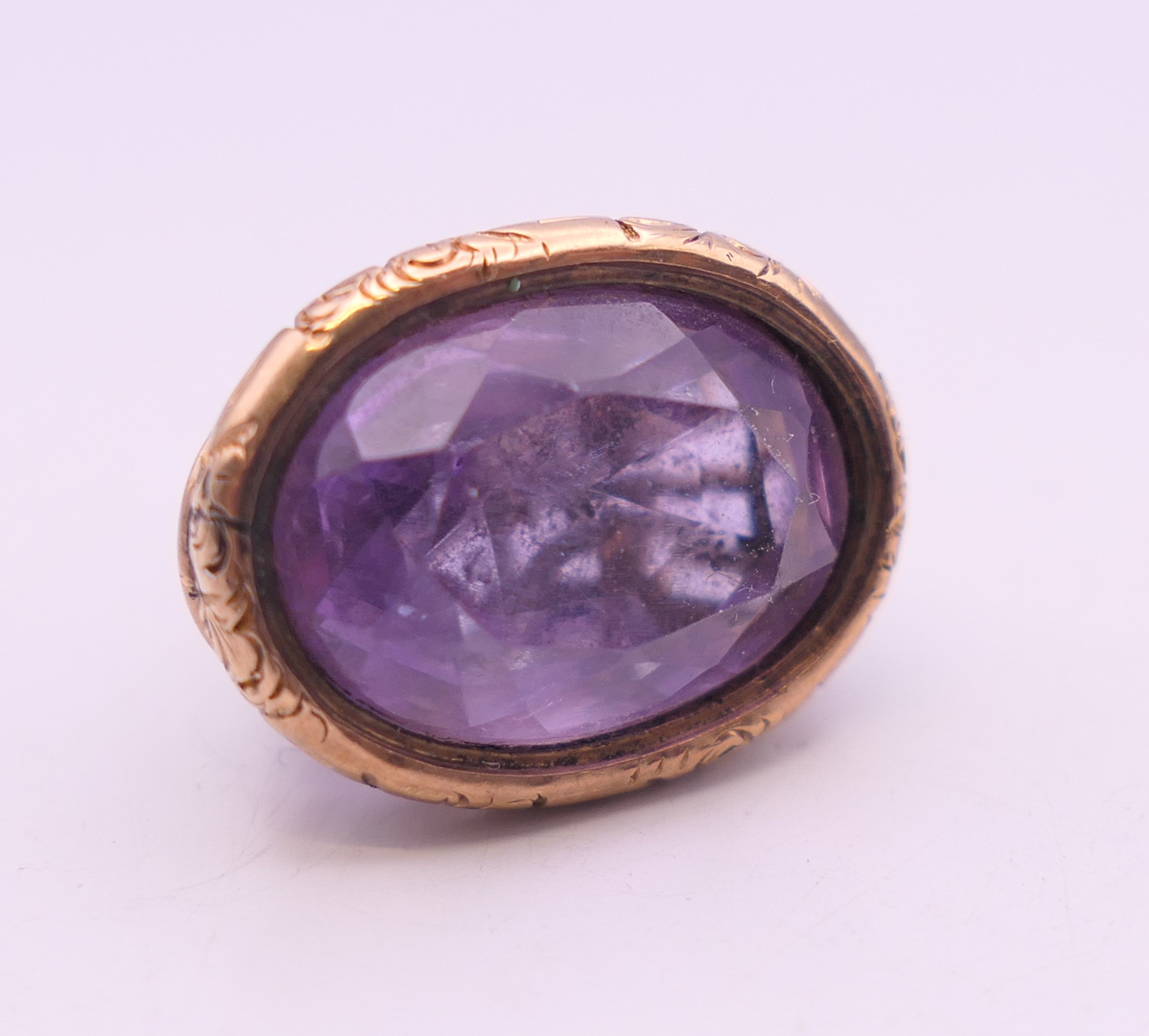 A 9 ct gold and amethyst rope design fob. 2 cm high. 5.2 grammes total weight. - Image 5 of 6