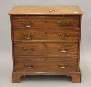 A George III mahogany chest of drawers. 75 cm wide.