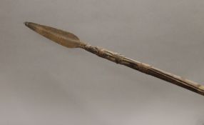 An antique tribal spear. 210 cm long.