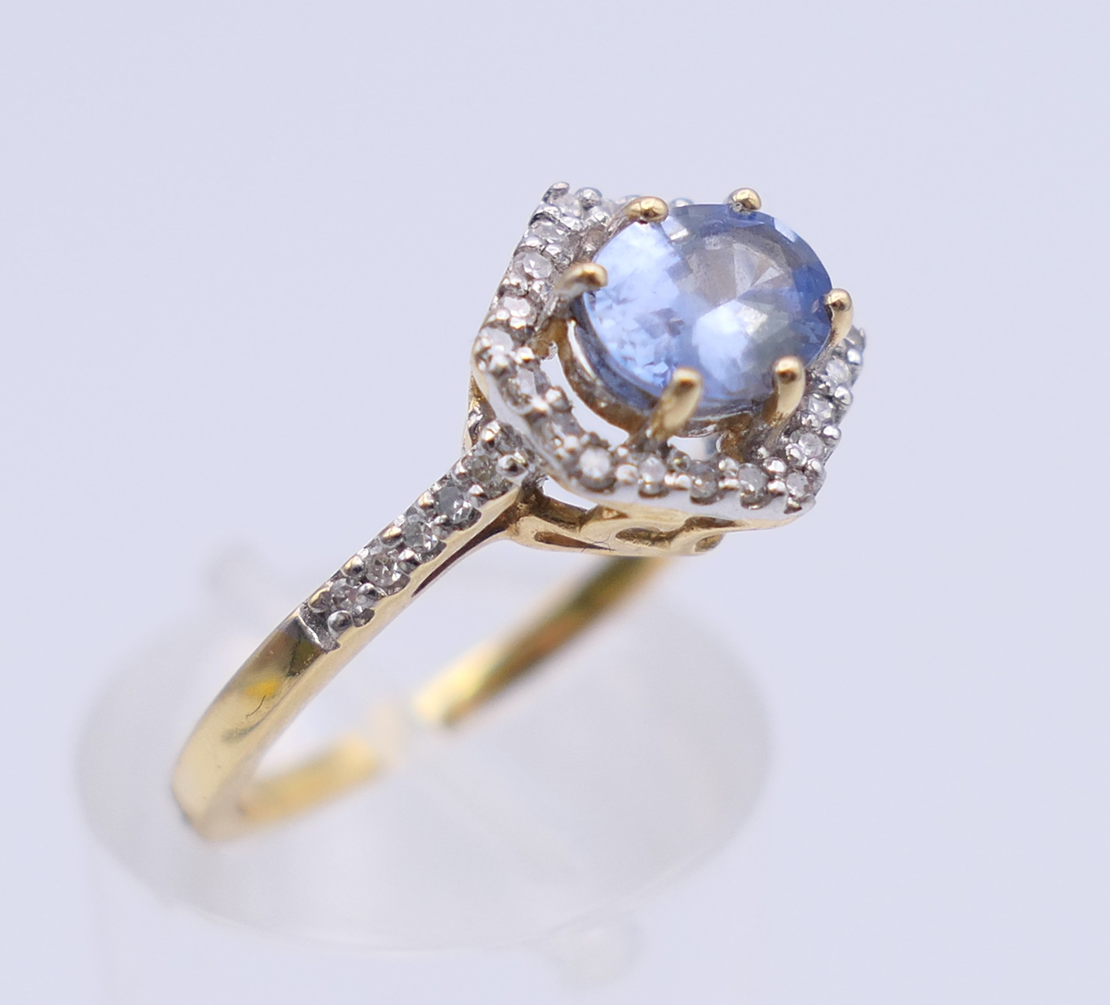 An 18 ct gold Ceylon sapphire and diamond ring. 10 mm x 10 mm. Ring size L/M. 3. - Image 4 of 9