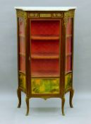 A Vernis Martin style glazed and painted cabinet, with marble top. 92.5 cm wide.