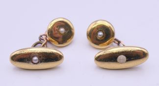 A pair of 18 ct gold and seed pearl cufflinks (link chains adapted, not all gold). 5.