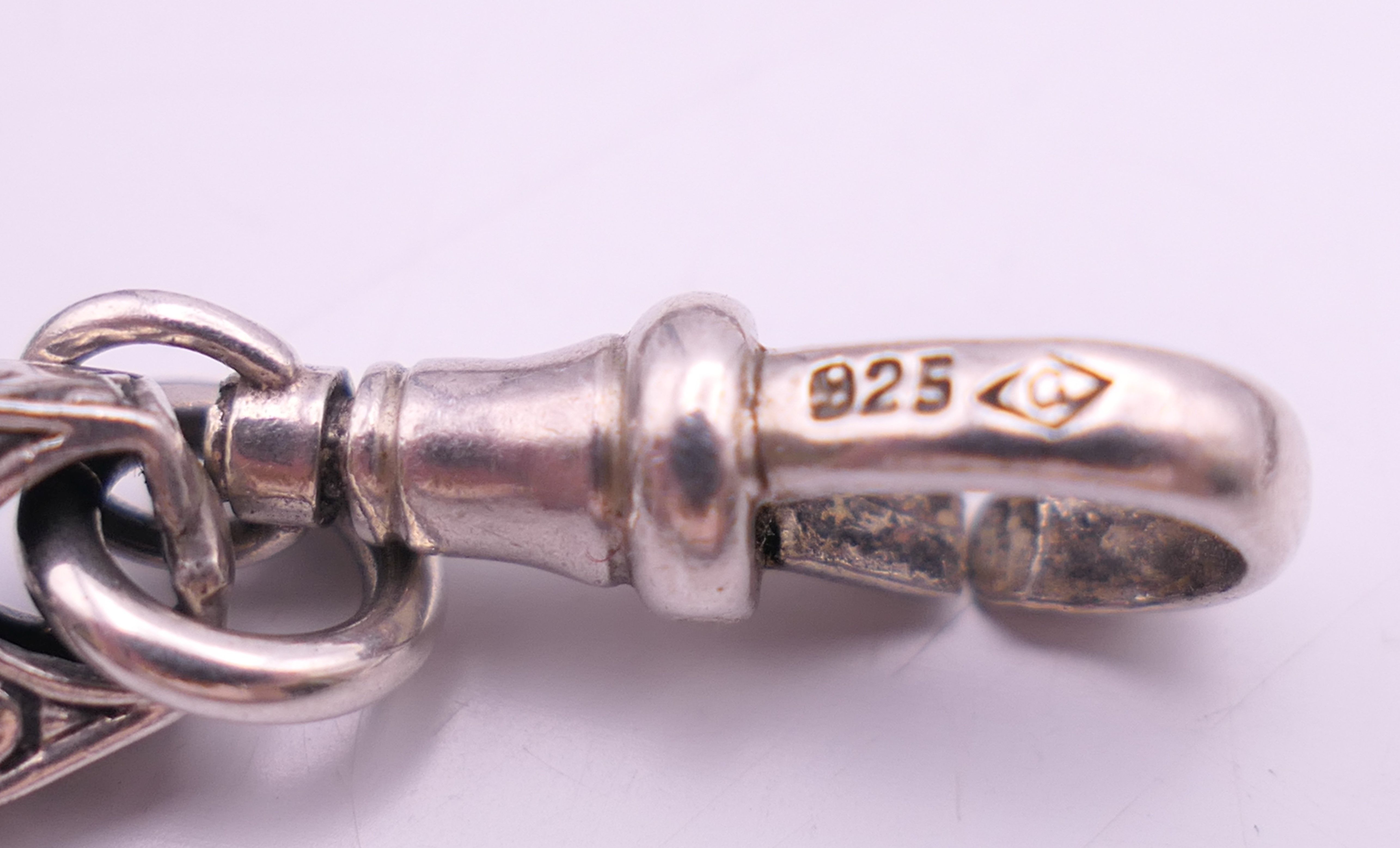 A silver watch chain with patterned links. 49 cm long. 49.1 grammes. - Image 5 of 7