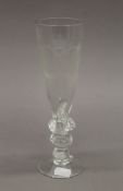 A Continental glass goblet etched with a double headed eagle. 24 cm high.