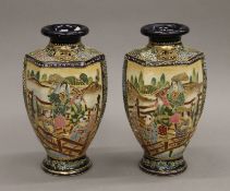A pair of Satsuma vases. 24.5 cm high.