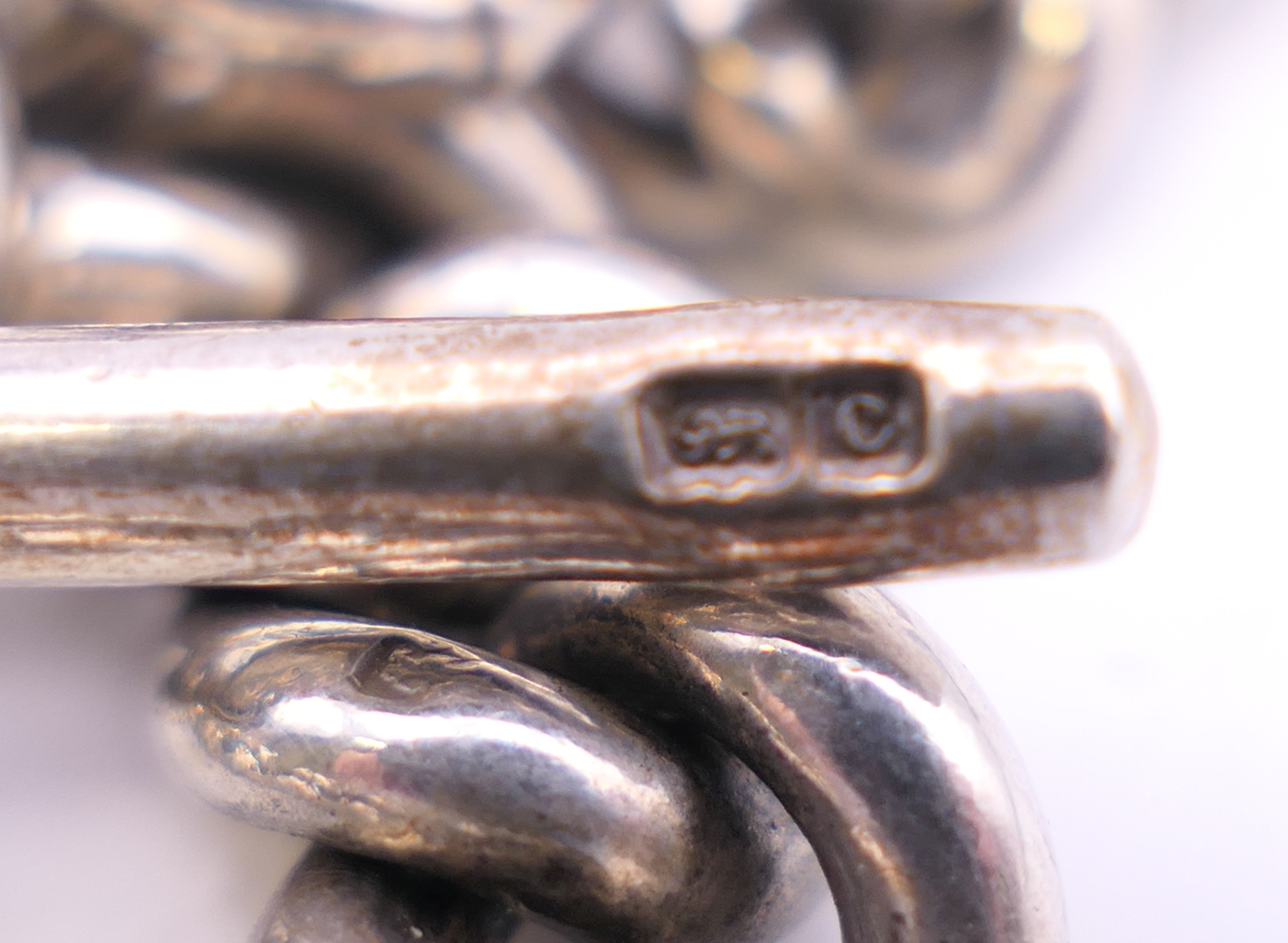 A silver watch chain. 34.5 cm long. 77.4 grammes. - Image 8 of 8