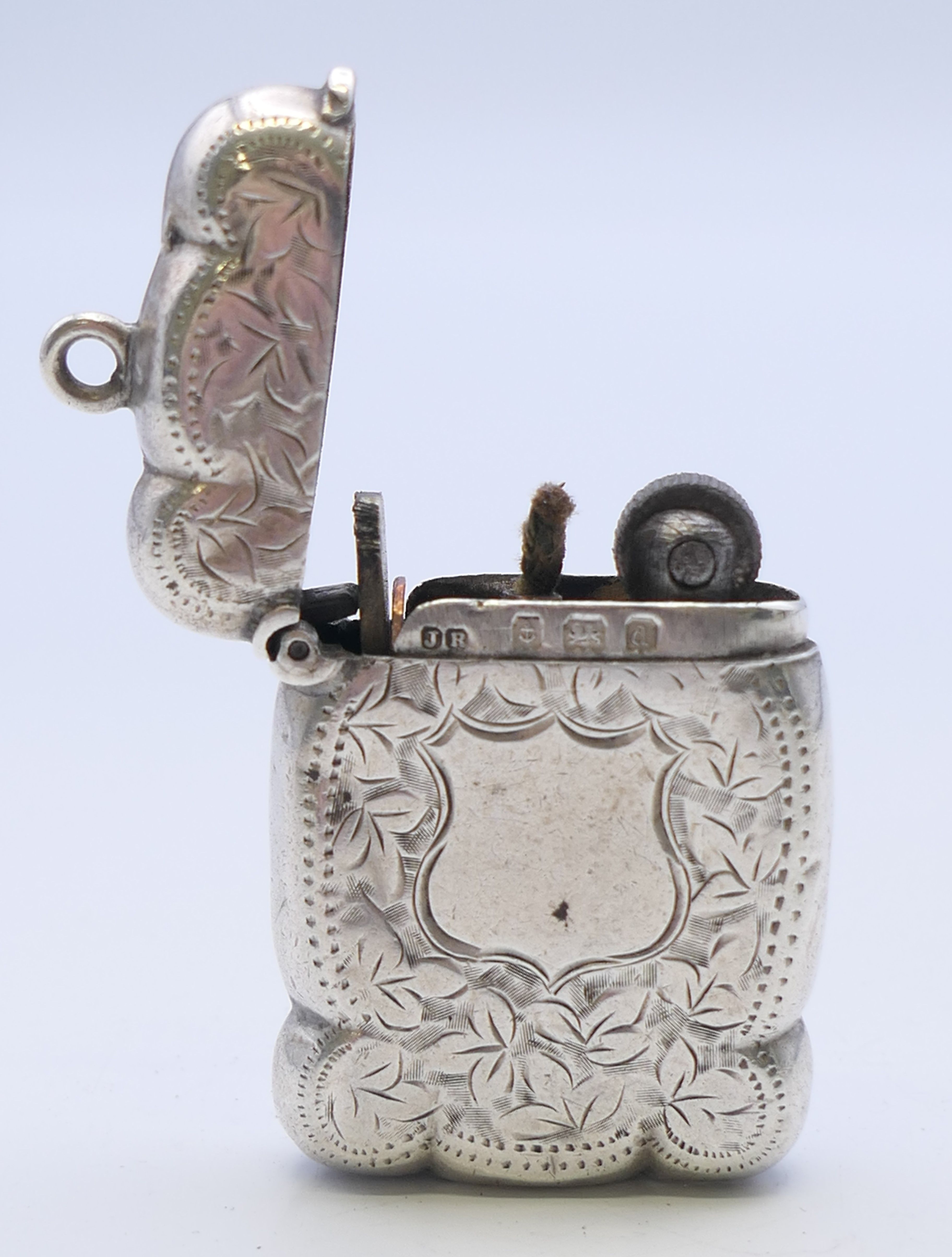 A Victorian silver vesta converted to a lighter, with leaf chased pattern, Birmingham 1875. - Image 4 of 6