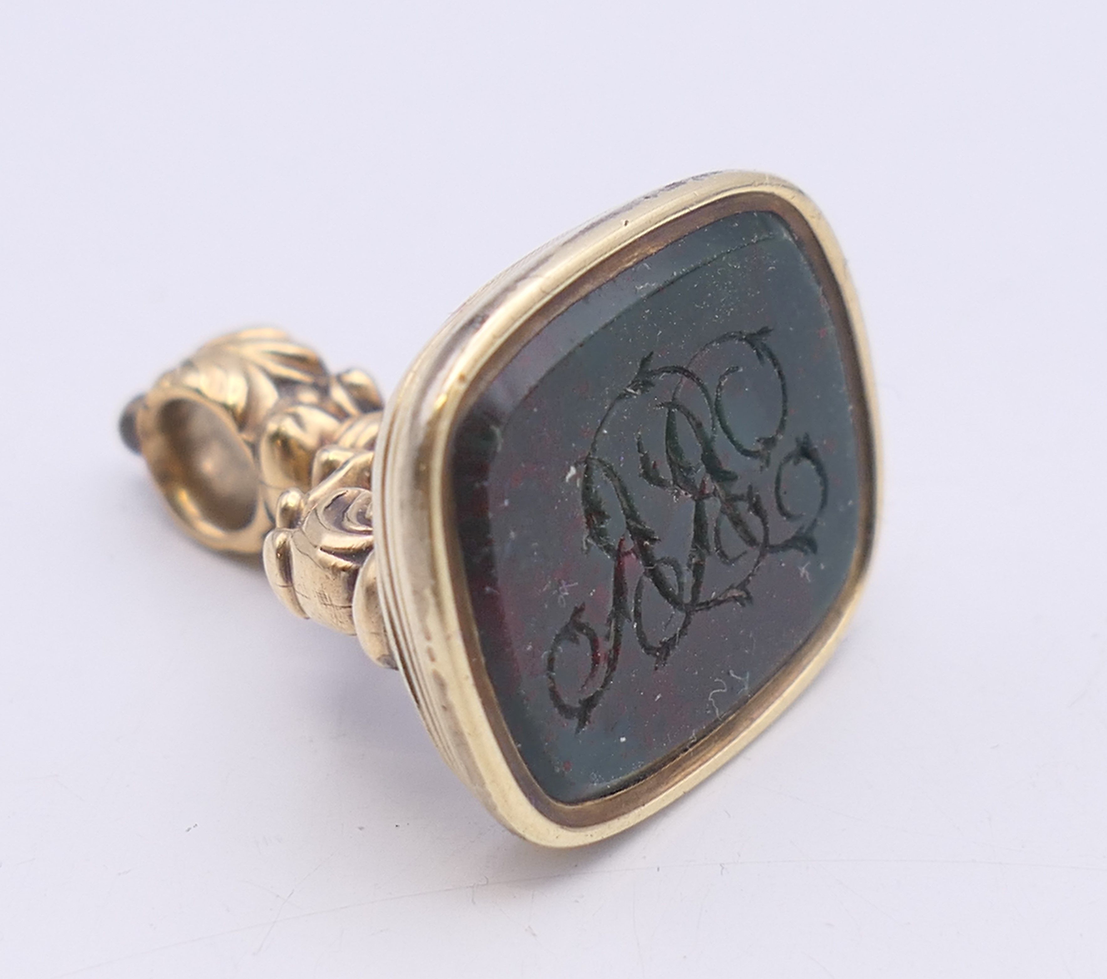 An unmarked 18 ct gold and bloodstone fob seal. 2.5 cm high. 12.2 grammes total weight.