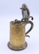 A Dunhill table lighter formed as a tankard. 9 cm high.