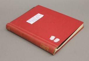 A stamp album containing British and Commonwealth stamps, including a good quantity of Mint stamps.