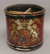 A stick stand decorated with a crest. 36 cm high.
