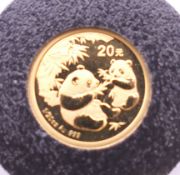 A 2006 1/20 ounce fine gold proof panda coin.