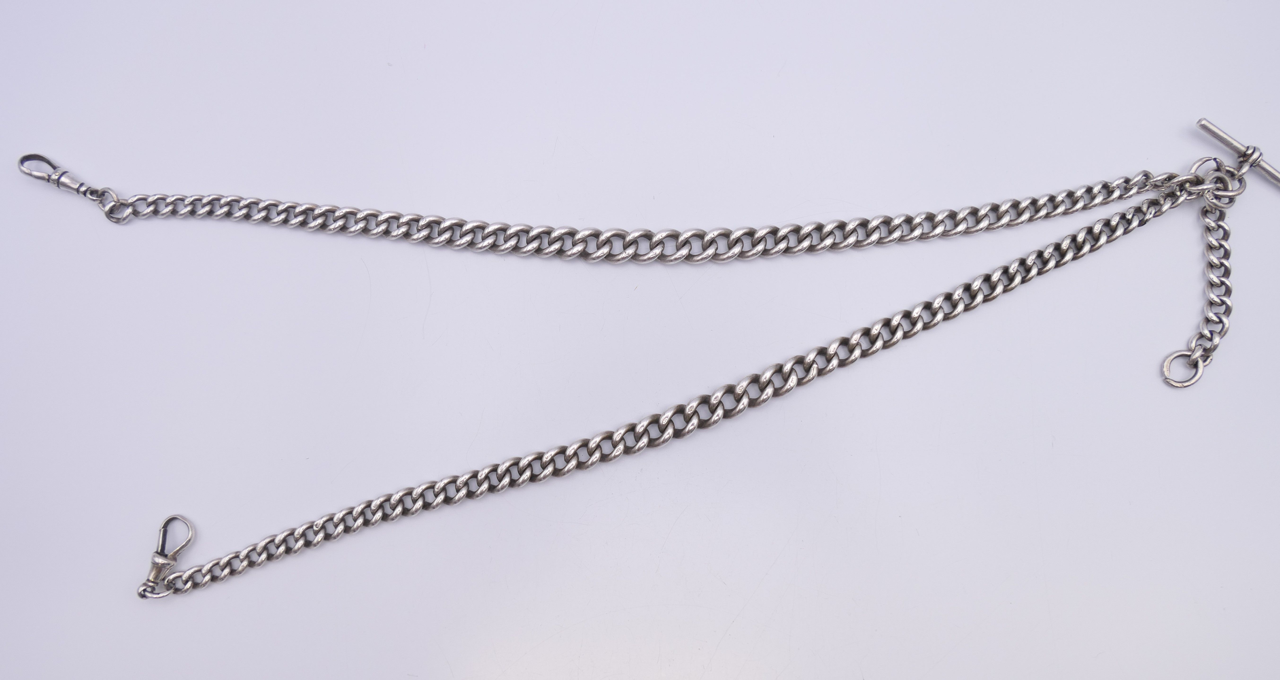 A silver watch chain. 67 cm long. 98.4 grammes. - Image 3 of 7