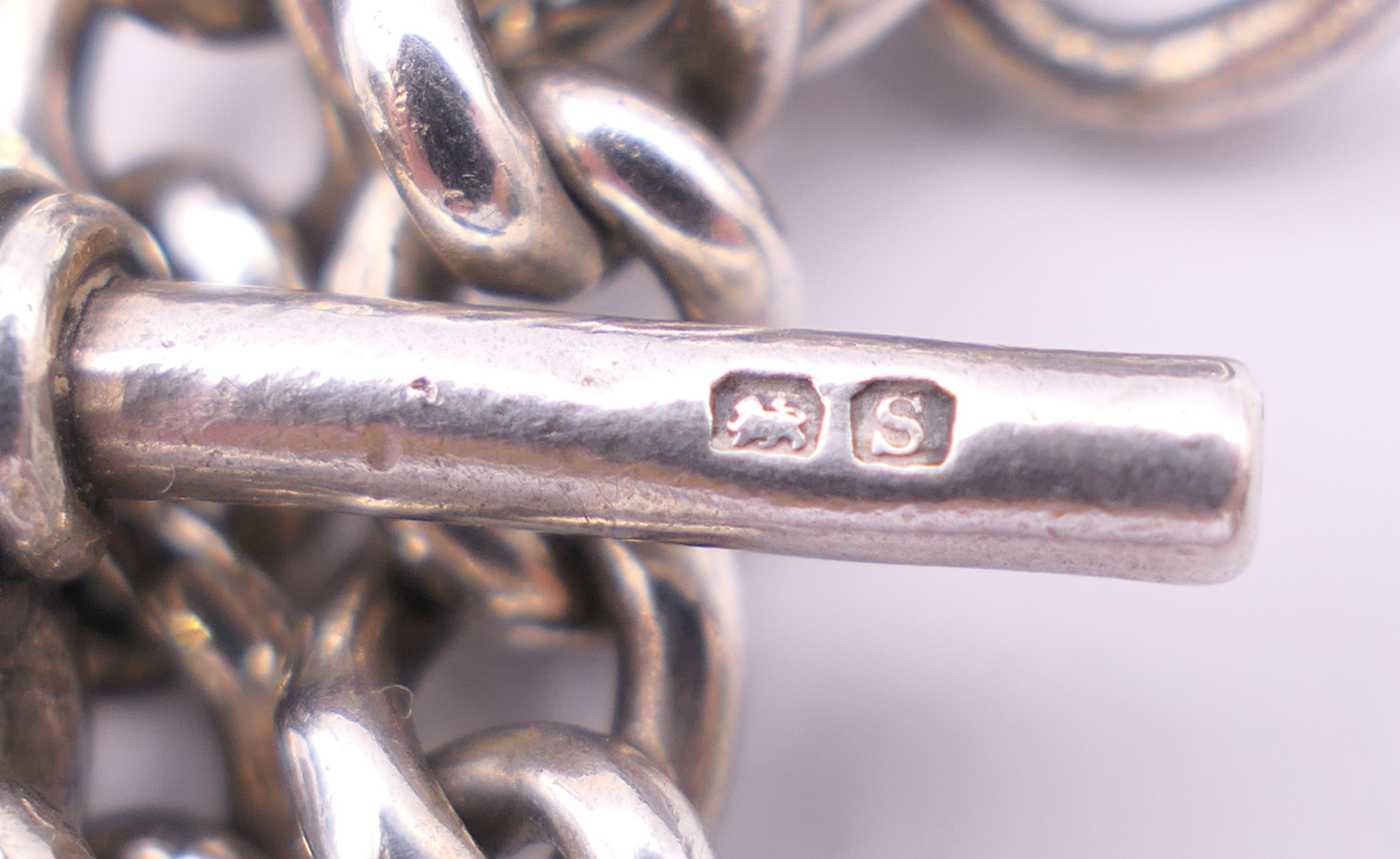 A silver watch chain. 67 cm long. 98.4 grammes. - Image 6 of 7