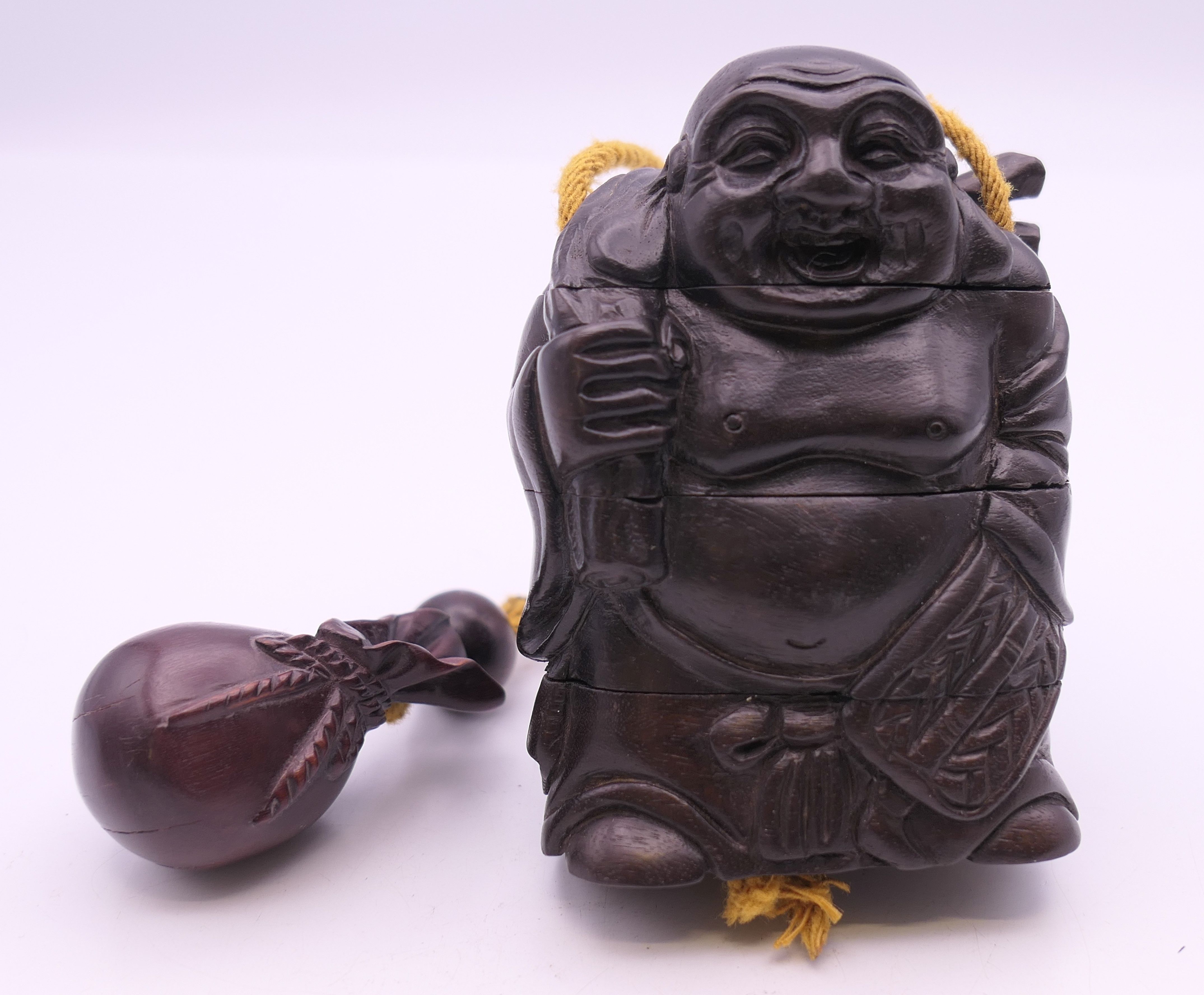 A Buddha form inro. 8 cm high.